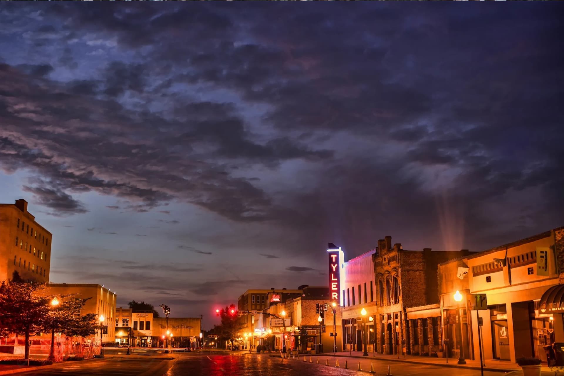 Tyler TX business owners discussing digital marketing strategy on a screen.
