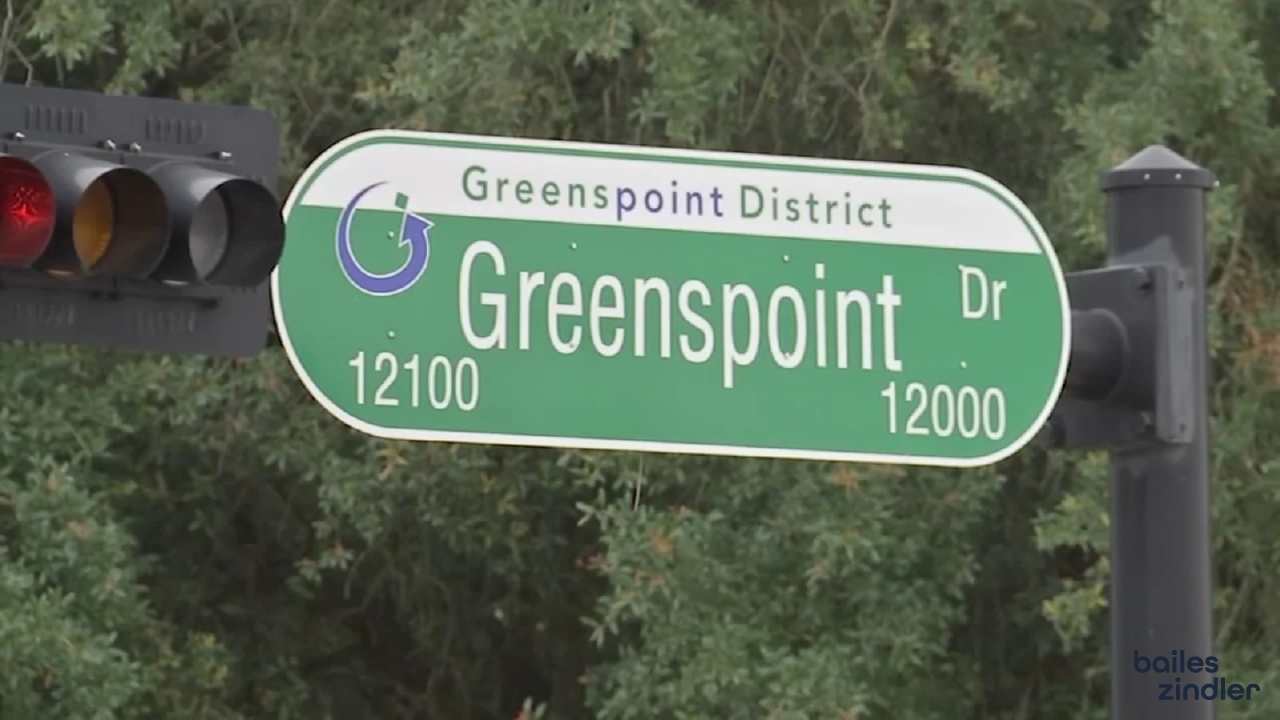 Smartphone showing local search results for businesses in Greenspoint, Houston.